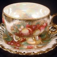 Royal Sealy Pearlized Fruit Motif 3 Toed Cup & Saucer
